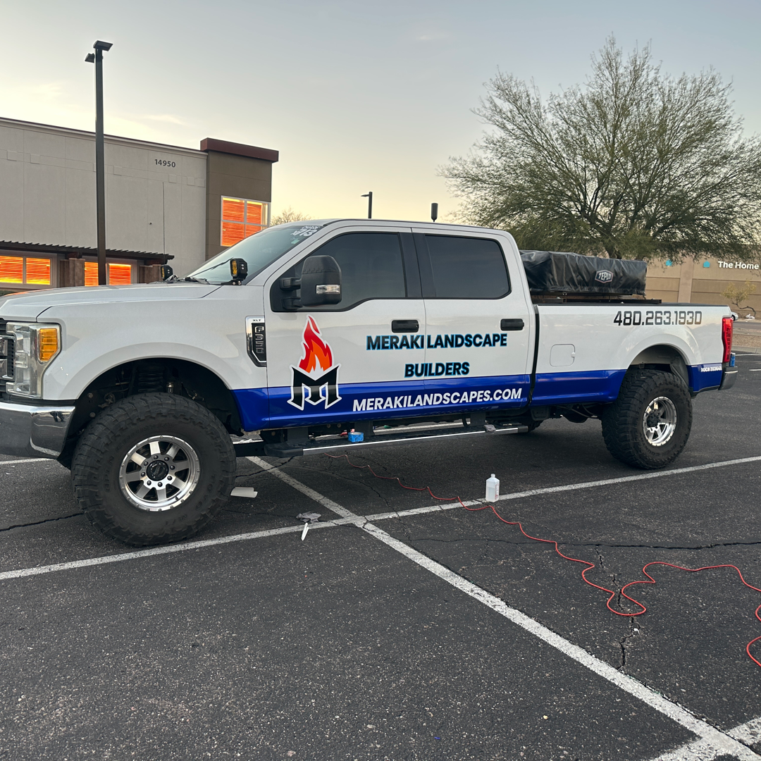 A custom commercial F250 with decals for a landscaping company "Meraki Landscape Builders" completed by Decalwolf Decal Wolf Arizona